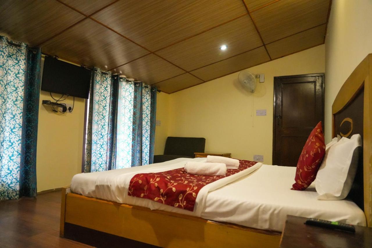 Hotel Grass Land Manāli Екстериор снимка